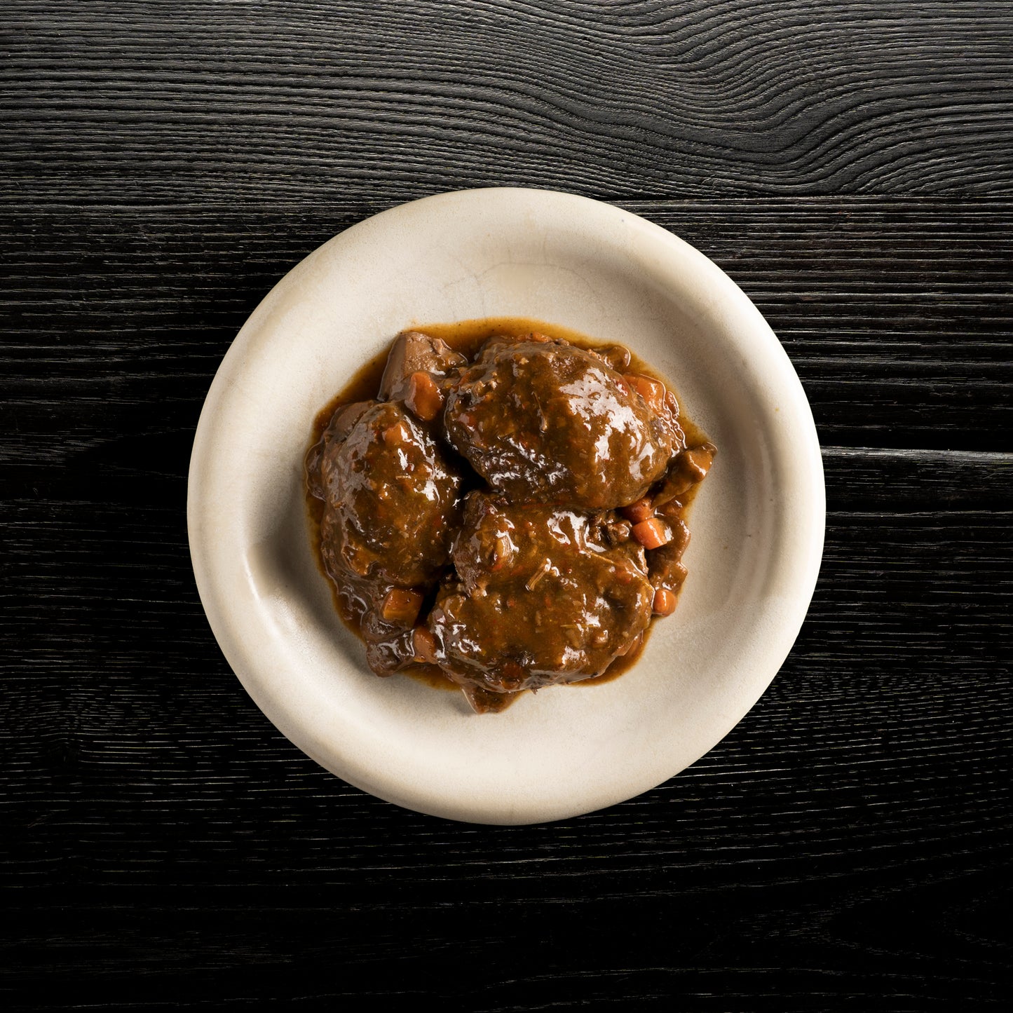 Carrilera de jabalí guisada y setas