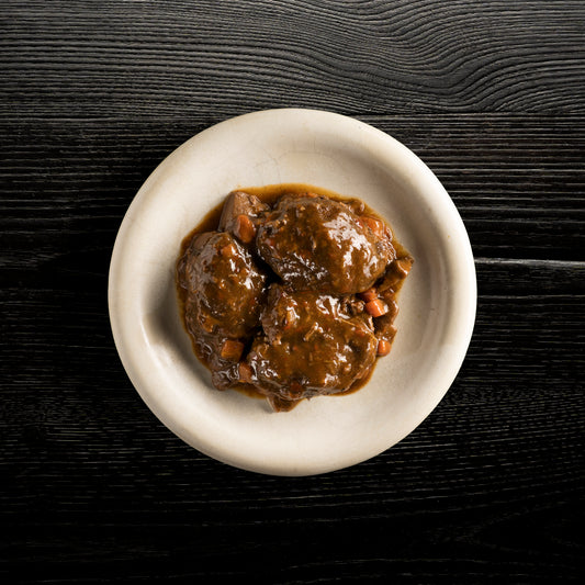 Carrilera de jabalí guisada y setas